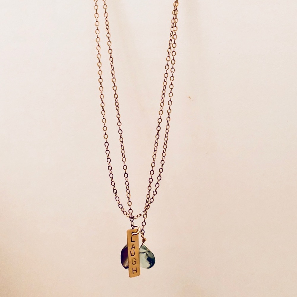 Handcrafted “LAUGH” necklace with stones